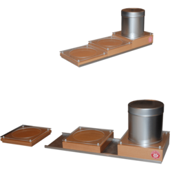 Genussdepot 'Teekanne' aus Edelstahl-C-Profil mit eingeschobenen Holzblocks und aufgesetzten Acrylglasfrästeilen